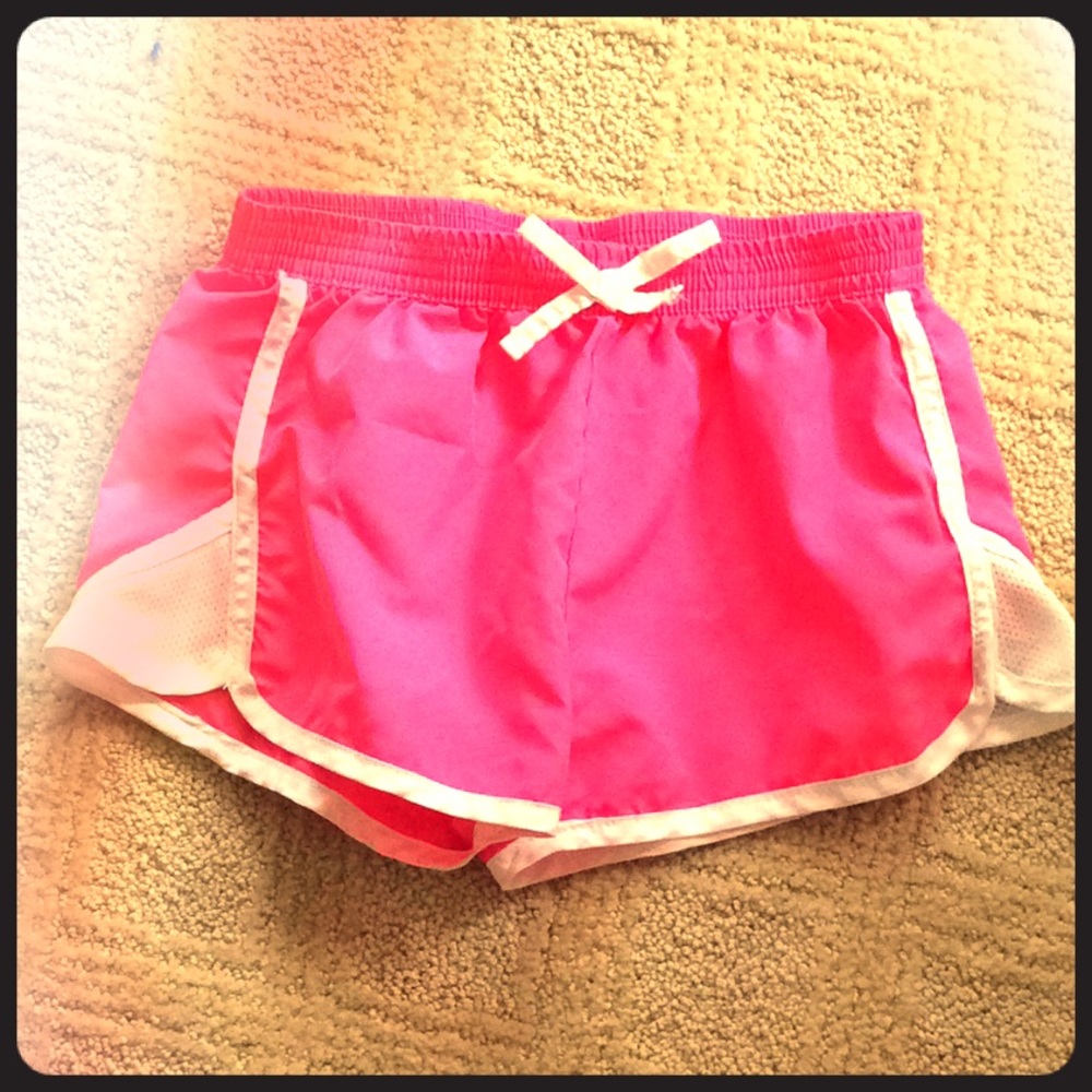 Girls pink swim shorts